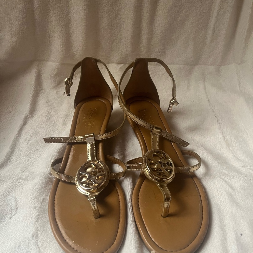 Coach Gold Sandals with Ankle Straps and Medallion